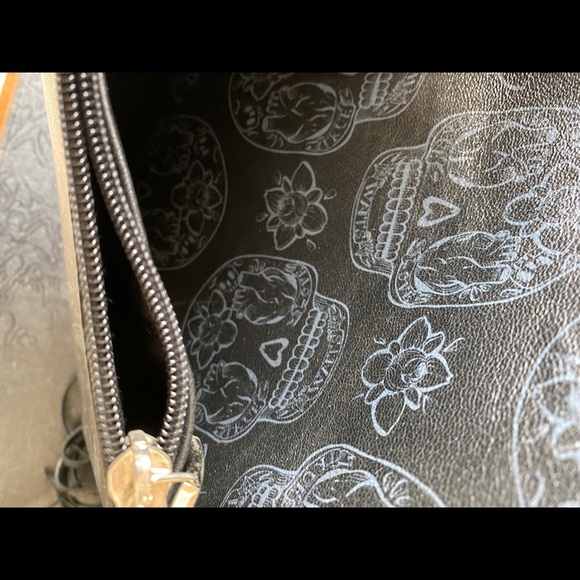 Italian Larettamia black leather and suede backpack with skull and flower motif main image 9